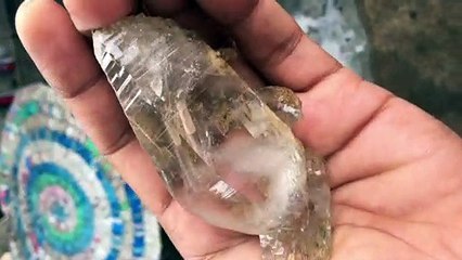 Water trapped inside crystal / found at river...natural