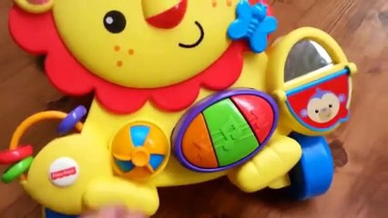 Quick Snippet Review: Fisher Price Musical Lion Walker Push Toy