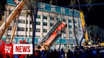 Sinkhole swallows bus in northwest China, killing six, ten missing