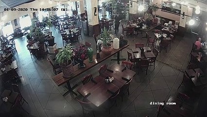 Runaway Tire Bursts through Restaurant Window