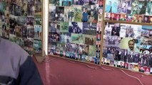 Kaporta dükkanının duvarlarını müşteri fotoğraflarıyla süsledi