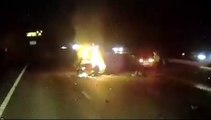 Incredible footage shows moment a hero lorry driver dragged a young woman from a burning car - seconds before it exploded in a fireball