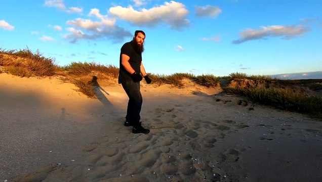 MMA ground and pound training Punches and hammer fists into the sand 3