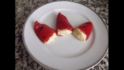 Piquillo peppers stuffed with potato omelette cream