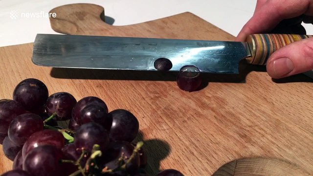 Incredibly sharp knife slices grape with super-satisfying ease