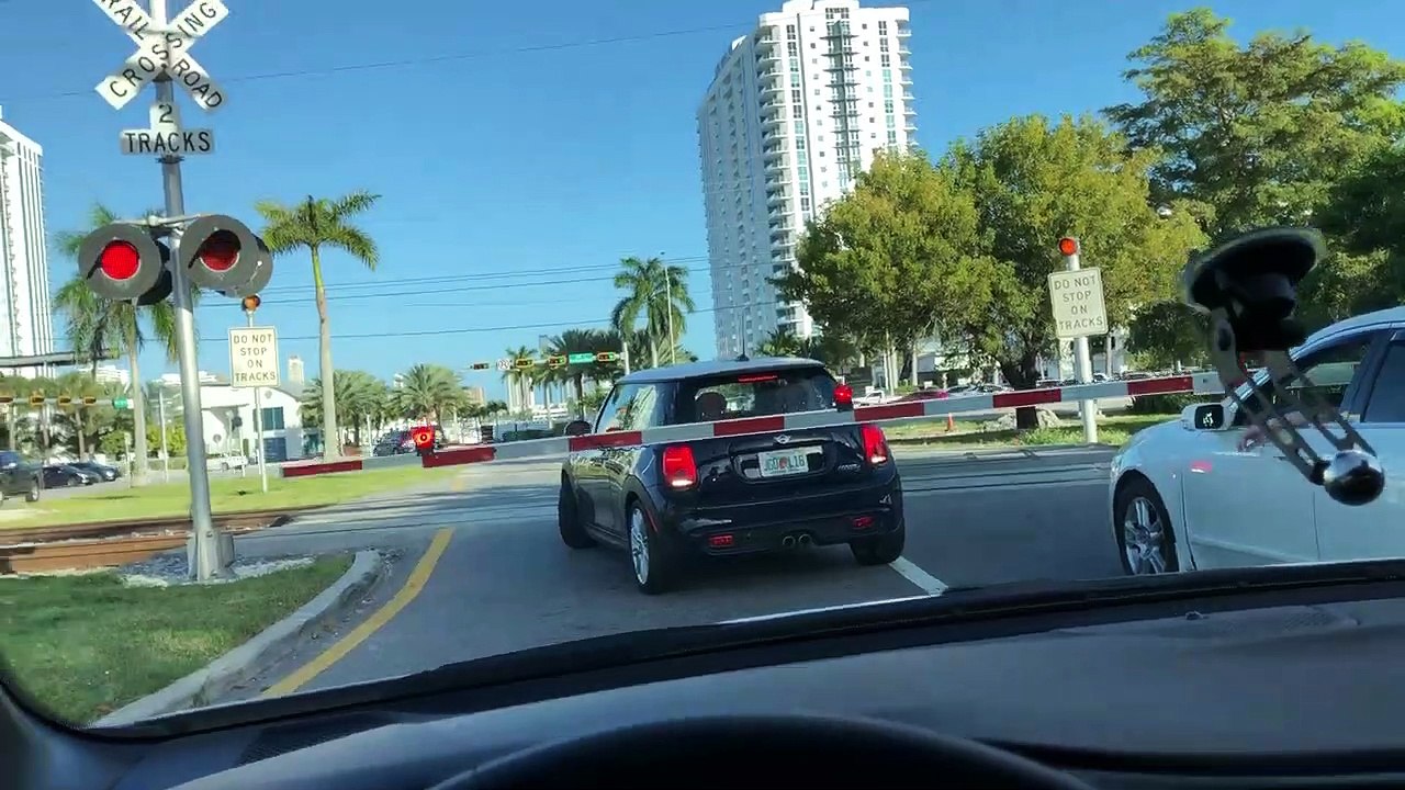 Express Train Slams Car at Crossing