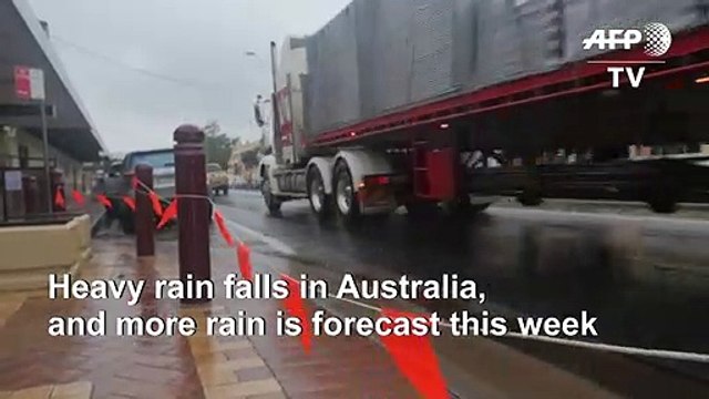 Rain falls in fire-ravaged Australia
