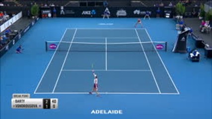 Home favourite Barty marches to semis