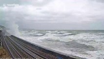 Moment Great Western Railway train makes emergency stop for injured passengers after windows smashed by Dawlish waves