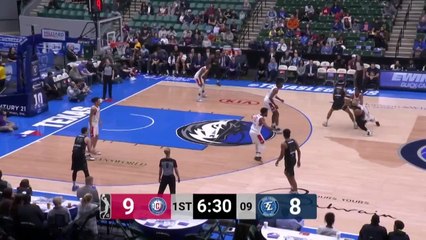 Aric Holman rattles the rim on the finish!