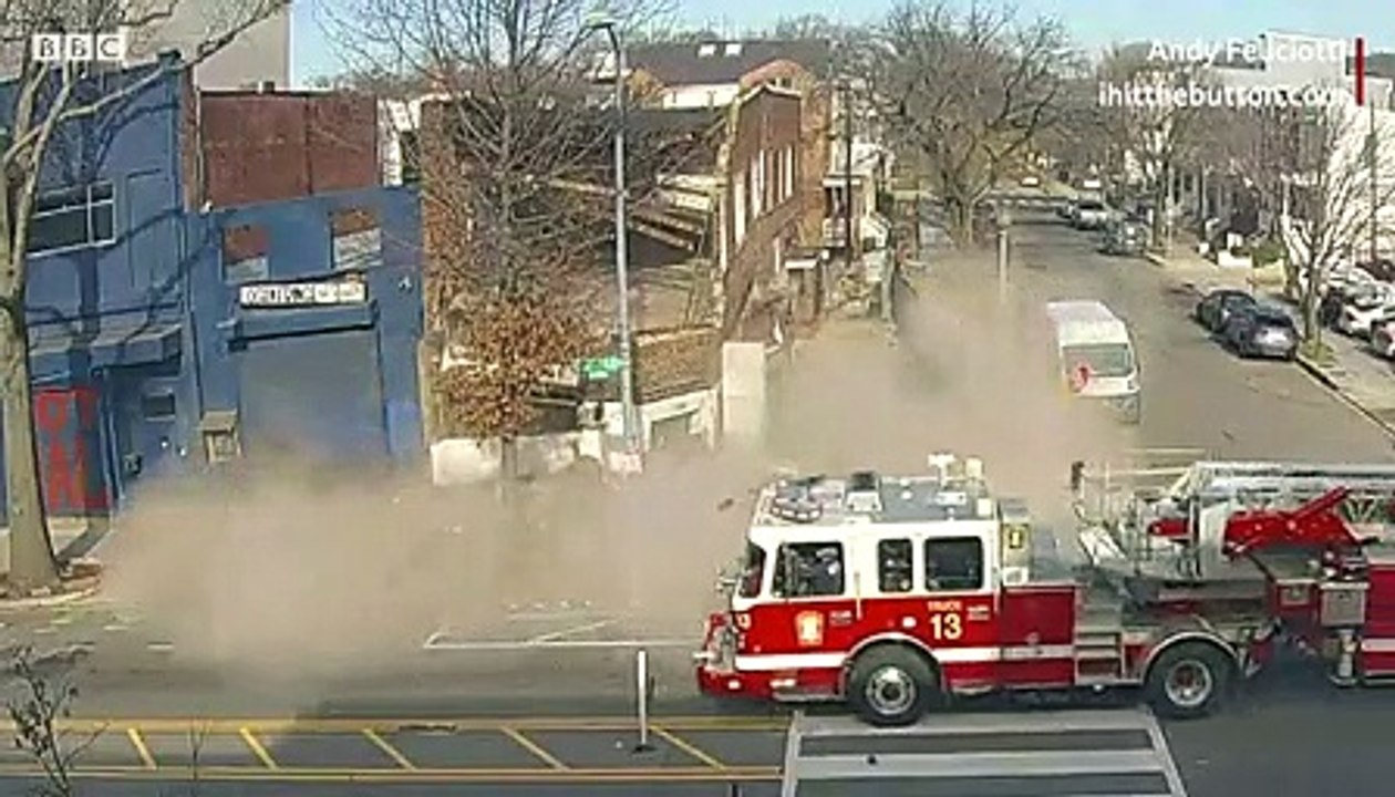 Building collapse misses pedestrians by seconds