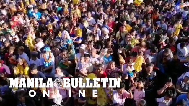 Devotees bring their Sto. Niños to be blessed during the Feast of Sto. Niño