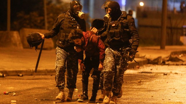 Dozens wounded as Lebanon's anti-gov't protests turn violent