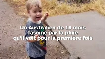 Un bébé australien fasciné par la pluie qui tombe enfin