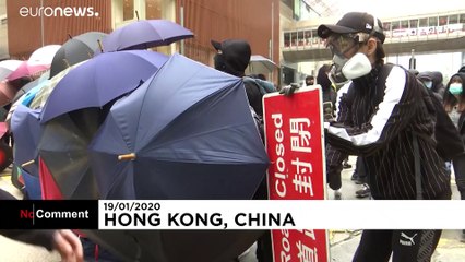 Rally cut short in Hong Kong as police confront protesters