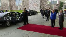 Erdoğan ile Merkel'in ''palto'' diyaloğu dikkat çekti