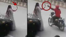 Viral Video :  UnKnown Person Grabs Mobile From Woman While Taking Sefie || Oneindia Telugu