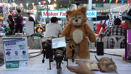 Artificial Intelligence Teddy Bear controlled by robot on display at Thai tech convention