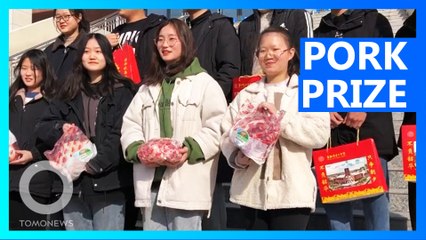 Chinese school rewards top students with bags of pork