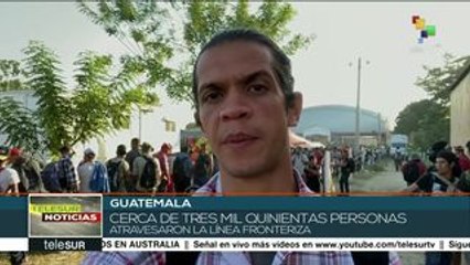Miles de migrantes esperan cruzar la frontera entre Guatemala y México