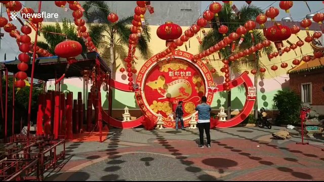 Decorations go up as staff prepare Indonesian temple for Chinese New Year celebrations
