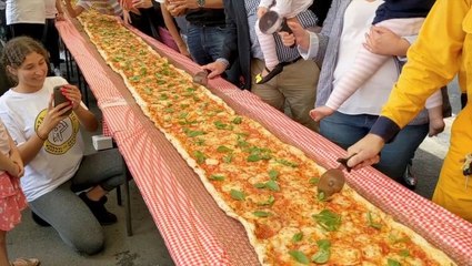 بطول 103 أمتار: مطعم إيطالي يدعم حرائق استراليا ببيتزا عملاقة