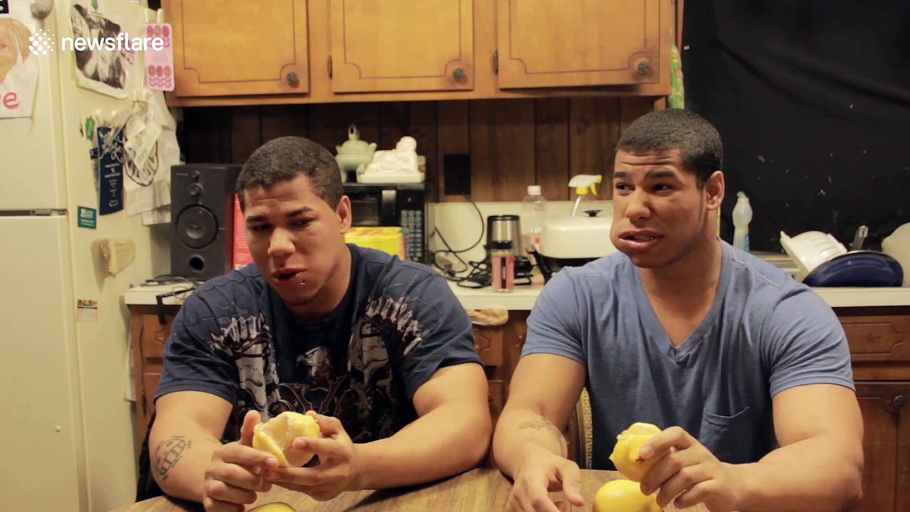US identical twins attempt to eat two unpeeled lemons in bittersweet competition