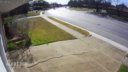 SUV Jumps Curb and Crashes Into Tree