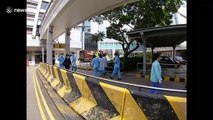 Hospital hosting patients with coronavirus in Hong Kong sees queues at pharmacy