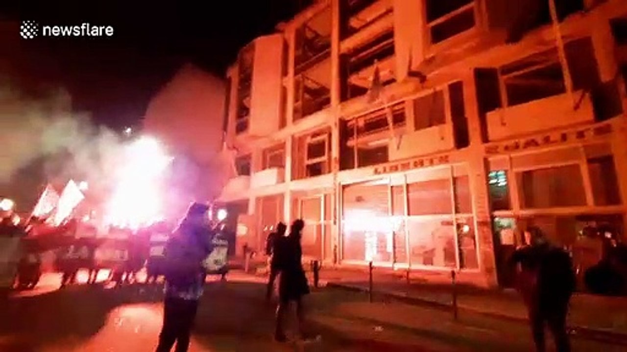 Riot police fire tear gas to disperse protesters in Nantes, France