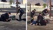 Un homme se fait dépouiller pendant qu'il se fait arrêter par la police