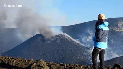 Hikers watch eruption from Italy's Mount Etna