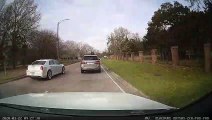 Car Ramps Off Truck's Trailer