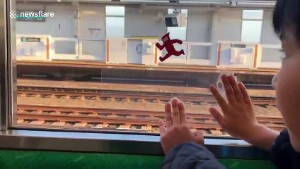 Japanese mum finds cute way to keep son entertained on train ride