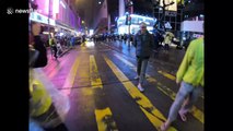 Mong Kok protesters hurl projectiles at Hong Kong riot police on first day of Lunar New Year