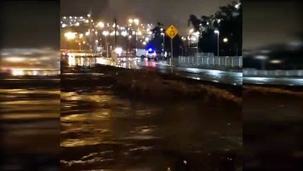 River Rises Rapidly Over Bridge After Heavy Rain