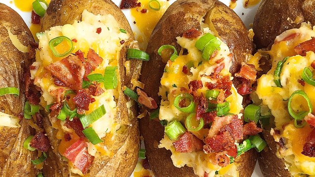These Loaded Baked Potatoes Are Deliciously Cheesy
