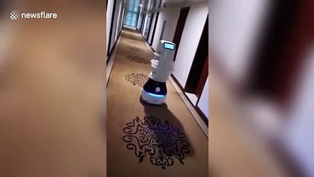 Robots used to deliver food to people quarantined in hotel to avoid spreading of coronavirus