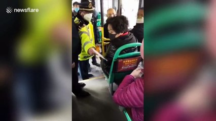 Elderly Chinese woman confronted after refusing to wear mask on bus during coronavirus outbreak