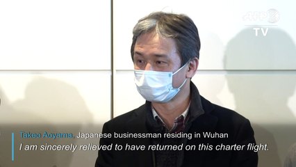 Japanese evacuated from Wuhan describe fear in virus epicentre