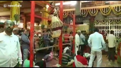 Seemingly ‘possessed' women perform bizarre feats at Indian temple of exorcism