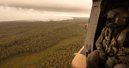 Avustralya'da yangın söndürmeye giden helikopterin ışıkları başka bir yangına sebep oldu