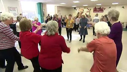 Duchess of Cornwall dances on visit to volunteer centre