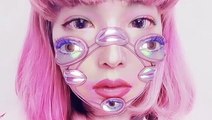 An artist creates 3-D makeup looks for celebrities like Charli XCX using CGI