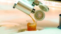 Robot bartenders mix drinks aboard Royal Caribbean's Symphony of the Seas cruise ship