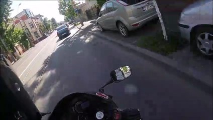 Motorcycle Rider Rescues Kitten From Road