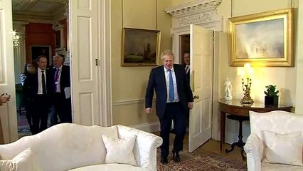 Mike Pompeo shakes hands with Boris Johnson at Downing St