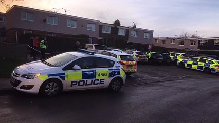 Police in negotiations with man after 'woman and child locked inside house'