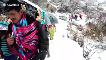 Heavy snowfall doesn't stop excited groom who braves winter blockades to reach bride in north India