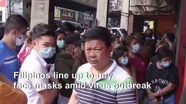 Filipinos line up to buy face masks amid virus outbreak